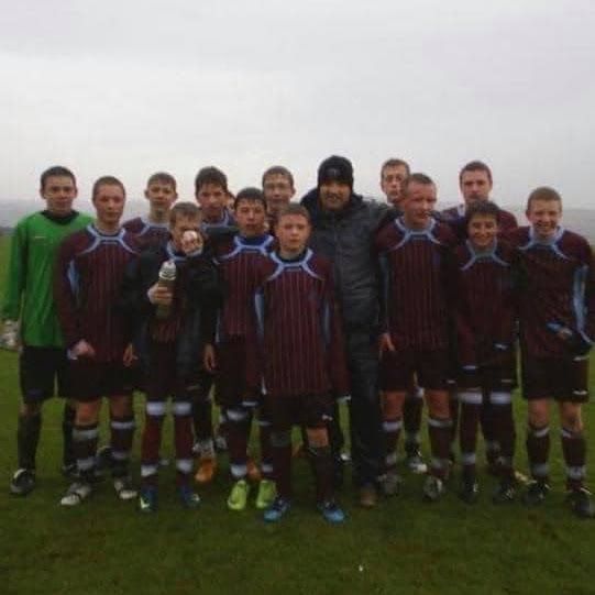 Our Woodhouse Junior F.C. team in claret pinstripe kits with our coach, at age 15